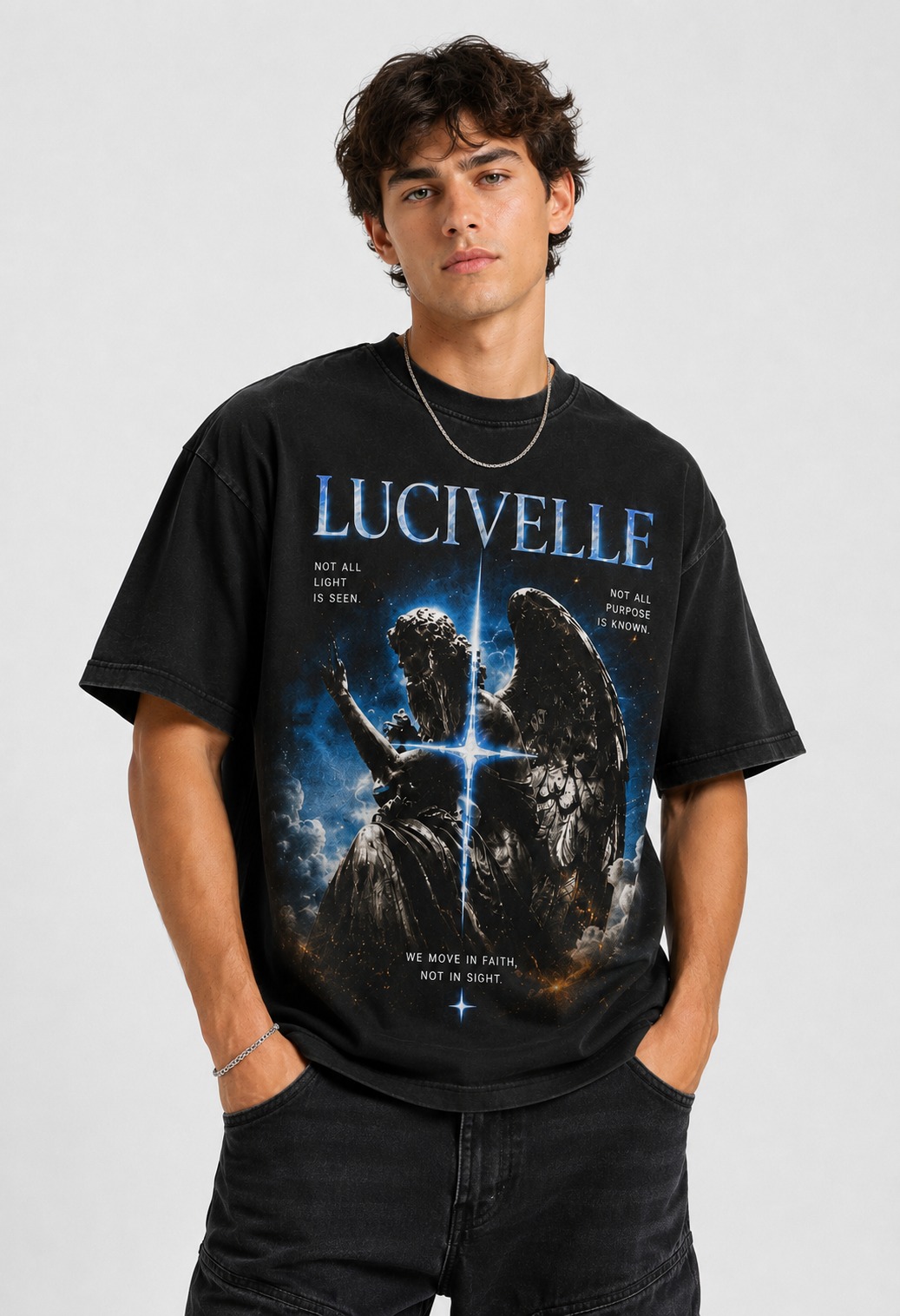 Man wearing the black Lucivelle celestial angel graphic tee